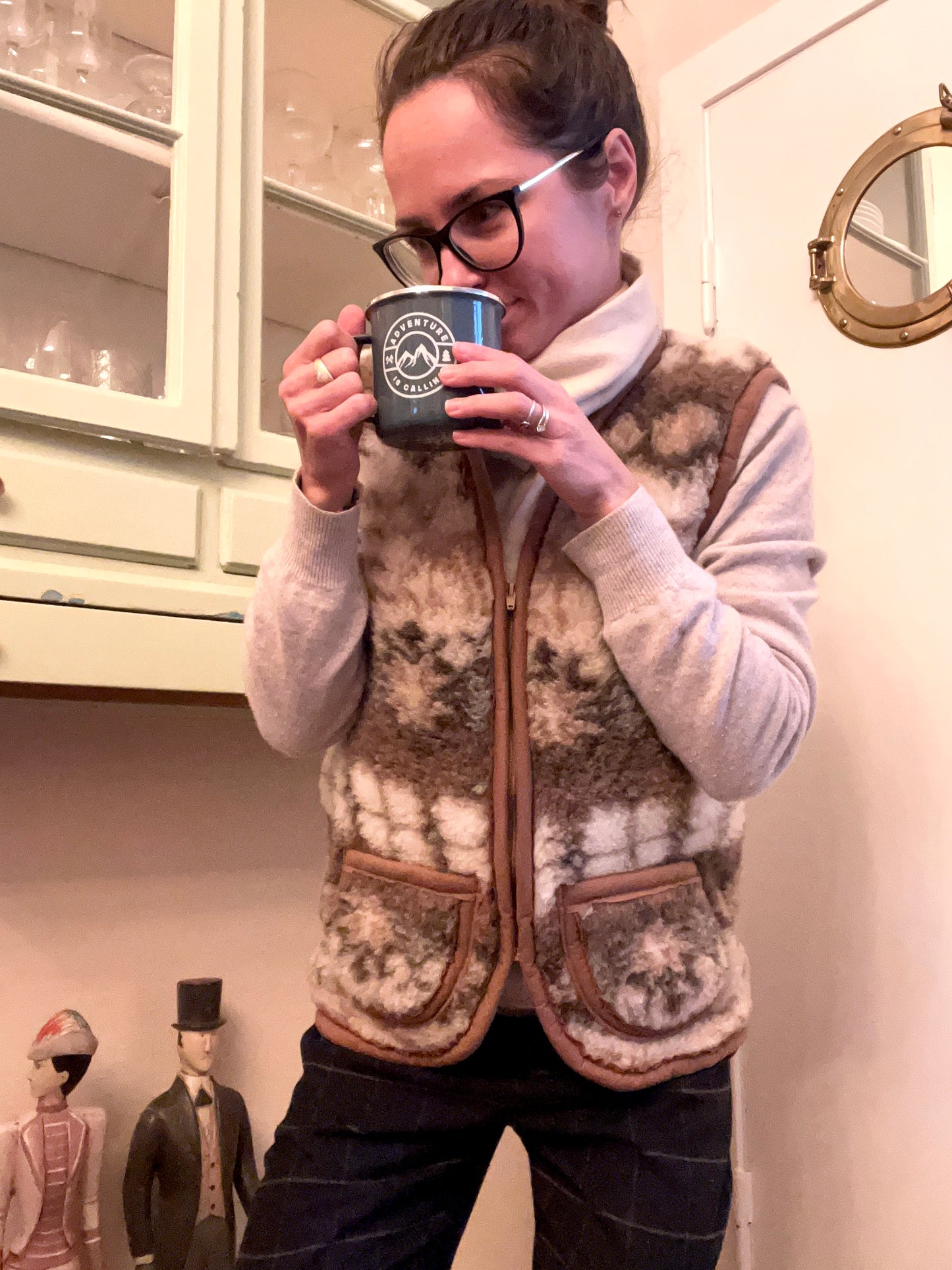Brown thick warm soft and fluffy merino wool vest with zipper closing and two practical front pockets. nature inspired pattern with deer and forest motive. breathable, natural , sustainable wool material. for both man or woman. nordic design uldvest